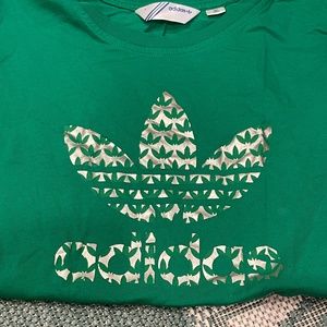 Women’s green Adidas trefoil silver foil short sleeve t-shirt size L